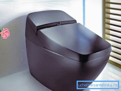 Visokotehnička smeđa WC školjka s ljubičastom nijansom savršeno će se uklapati u minimalistički dizajn. Visokotehnička smeđa WC školjka s ljubičastom nijansom savršeno će se uklapati u minimalistički dizajn.